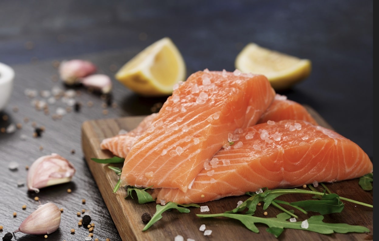 raw salmon filets - part of a healthy skin diet

